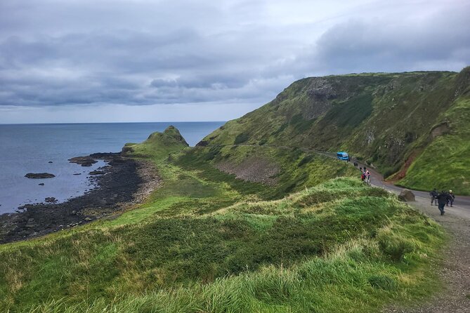 Five Star Giant's Causeway & Belfast Luxury Private Excursion. - Dunluce Castle above the sea