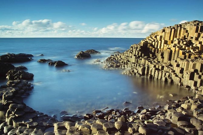 Giant's Causeway Day Tour and Belfast City Tour 1 Day Pass - Dunluce Castle from the coastal viewpoint