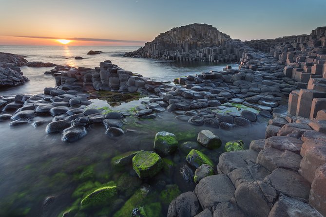 Giants Causeway, Rope Bridge, Carrickfergus Castle and Dark Hedges Tour - The Glens of Antrim from a moving coach