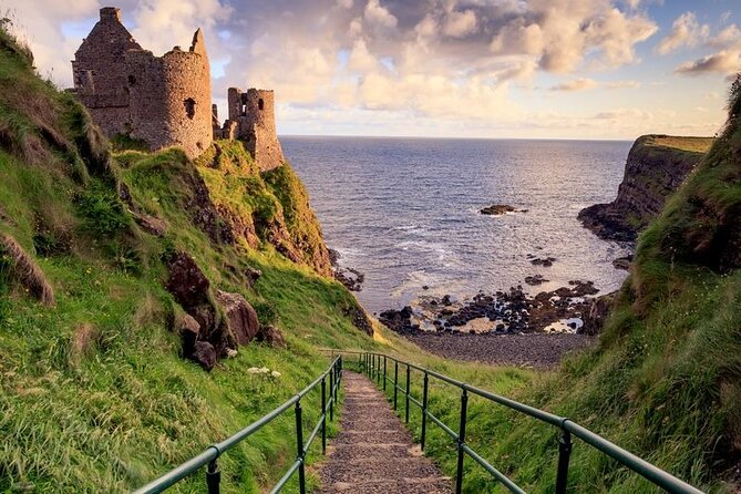 Giants Causeway Tour from Belfast + FREE Belfast Mural Tour - Dunluce Castle, Bushmills, and the best coastal views